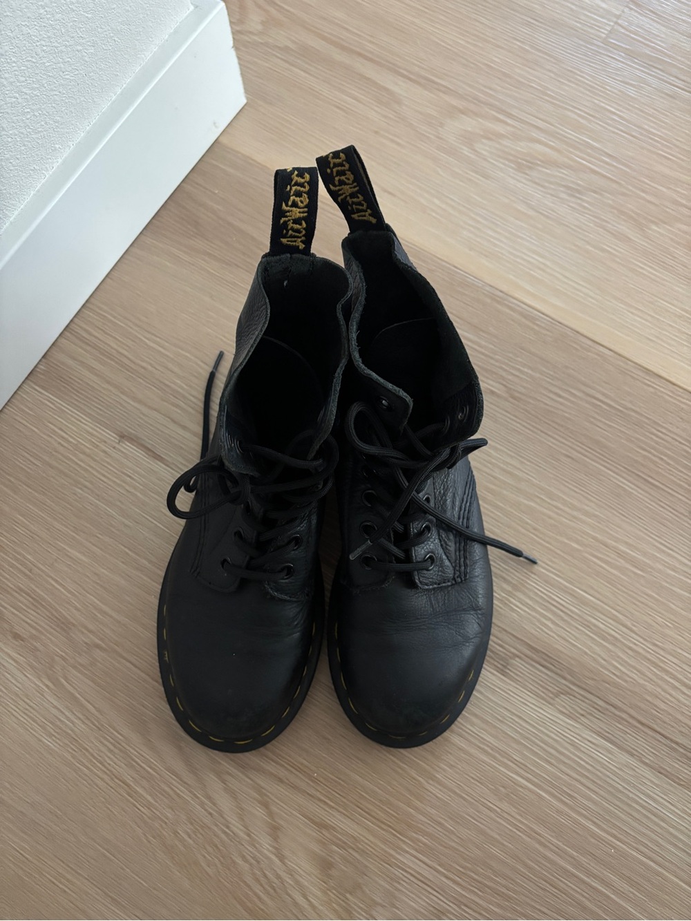 Dr. Martens Black Leather 6-Eye Lace-Up Ankle Boots with Yellow Stitching